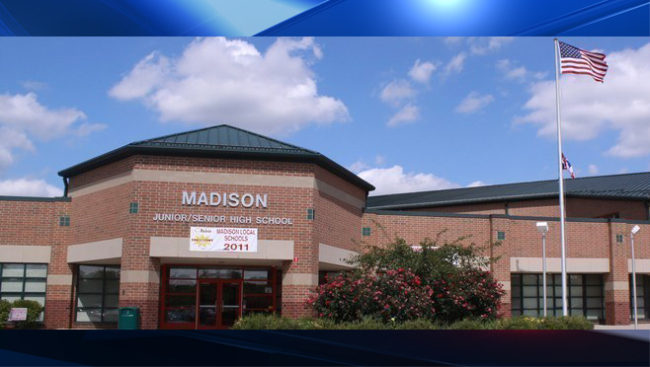 Officials outside of Madison Junior and Senior High School