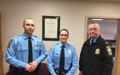 Officer Ashley Guindon center with two fellow officers