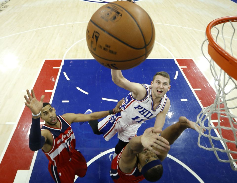 Wall has double-double to lead Wizards past 76ers 103-94