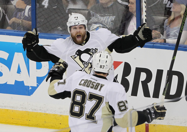 Pittsburgh Penguins right wing Phil Kessel celebrates his goal with teammate Pittsburgh Penguins center Sidney Crosby, during the first period of G