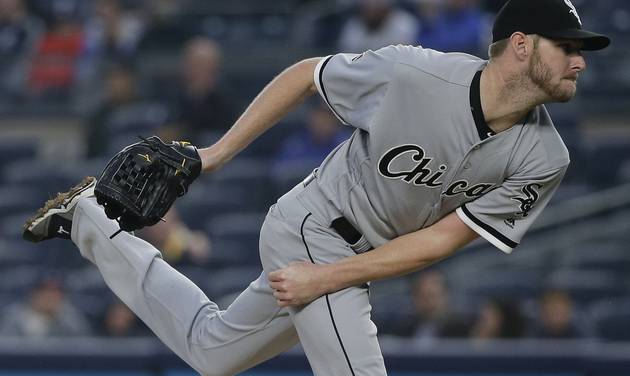 Chicago White Sox's Chris Sale follows through on a pitch to the New York Yankees during the first inning of a baseball game Friday