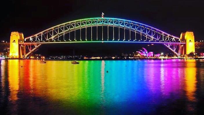 An image of the Sydney Harbour Bridge lit up to honour victims of the Orlando massacre