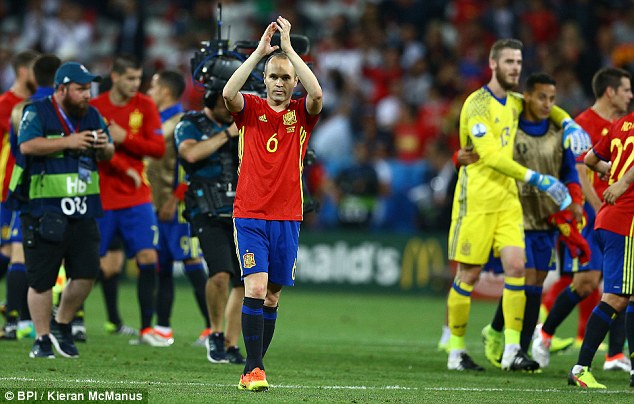 Andres Iniesta applauds the crowd after the final whistle of Spain's defeat of Turkey 3-0 at Euro 2016