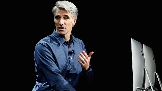 Craig Federighi Senior Vice President of Software Engineering for Apple discusses the Siri desktop assistant for Mac OS Sierra at the company's World Wide Developers Conference in San Francisco