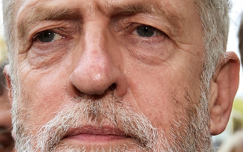 Opposition Labour party leader Jeremy Corbyn addresses a gathering of supporters demonstrating in Parliament Square in central London Britain