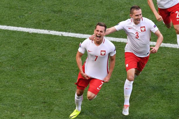 Boris Horvat  AFP  Getty

Milik celebrates the opening goal for Poland