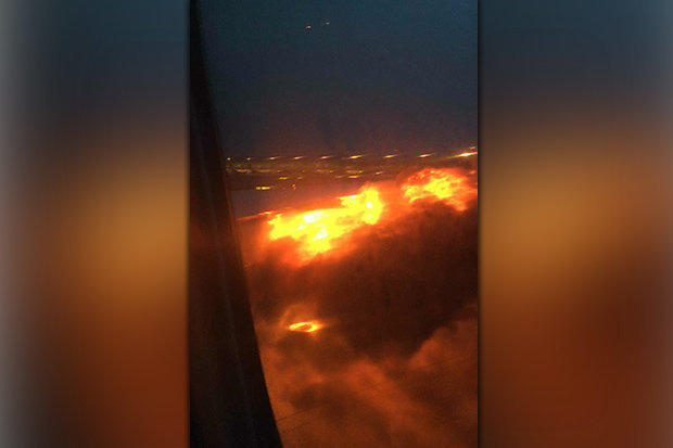 The shocking footage of the plane burning was captured by a passenger