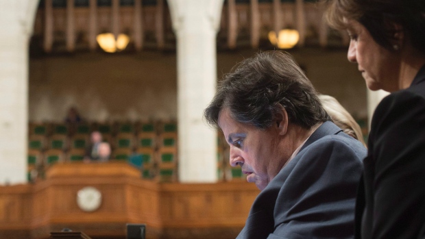 Member of Parliament for Ottawa Vanier Mauril Belanger who lives with ALS, uses a tablet with text-to-speech program to defend his proposed changes to neutralize gender in the lyrics to'O Canada in the House