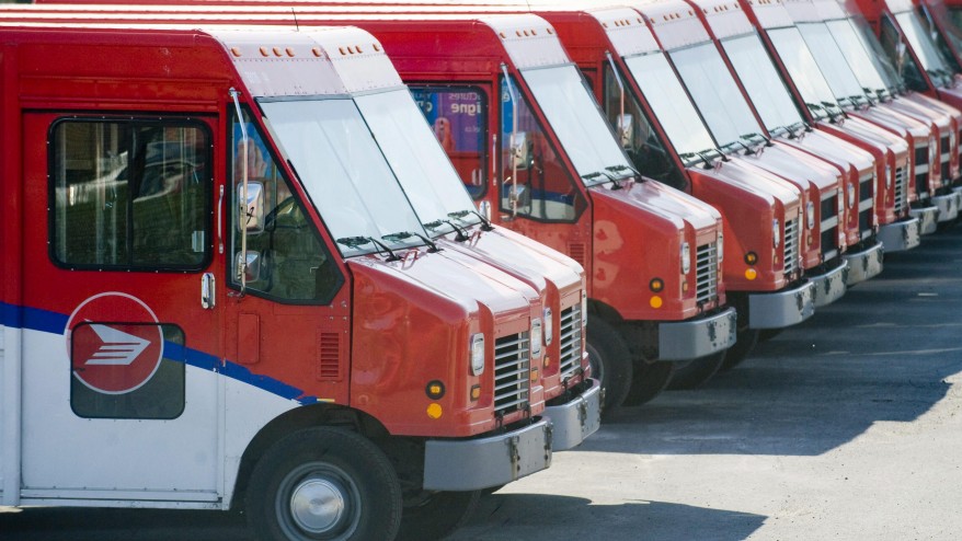 Canada Post vehicles in Montreal. THE CANADIAN PRESS  Graham Hughes