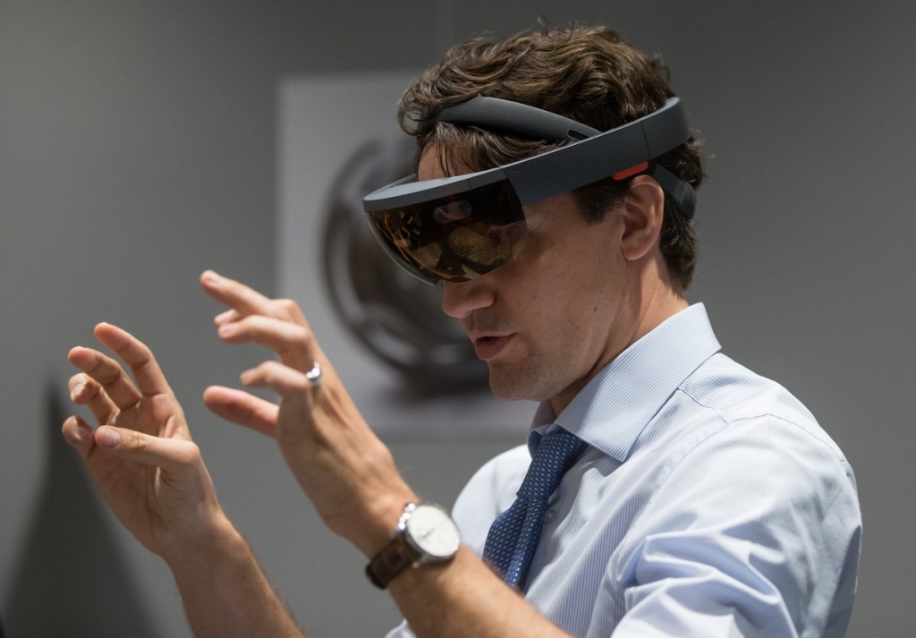 Canadian Prime Minister Justin Trudeau tries on the Microsoft Holo Lens goggles.   Microsoft