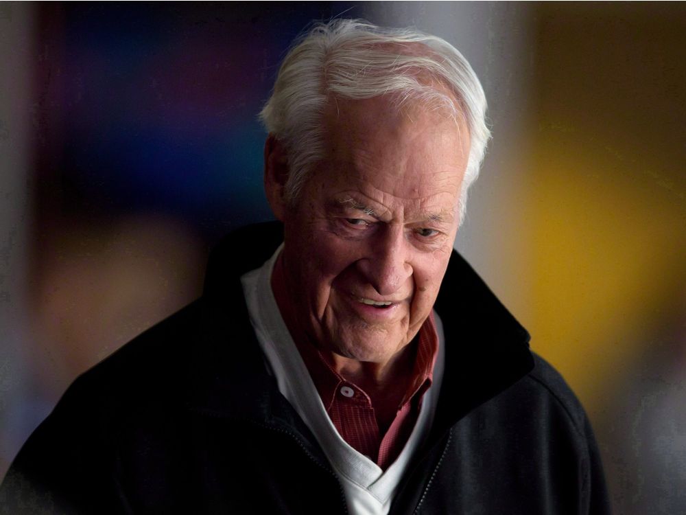 Hockey great Gordie Howe is shown watching the Vancouver Canucks and San Jose Sharks play an NHL hockey game in Vancouver B.C. on Thursday