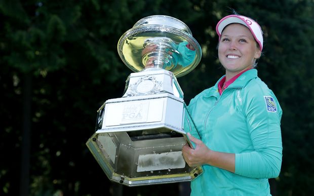 Canadian winner Brooke Henderson poses with the Women's PGA Championship trophy at Sahalee Country Club