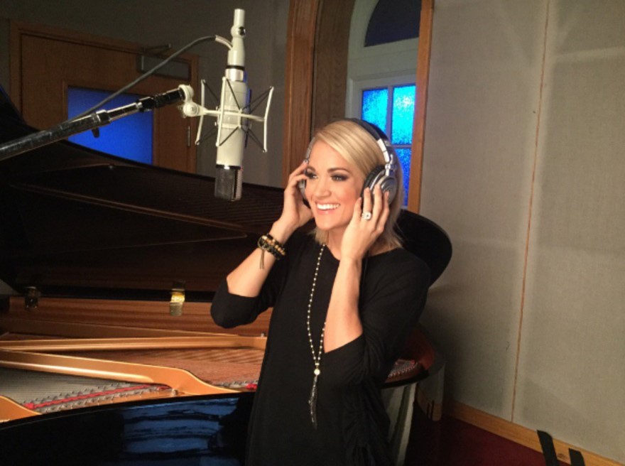 Carrie Underwood getting her football on in the studio