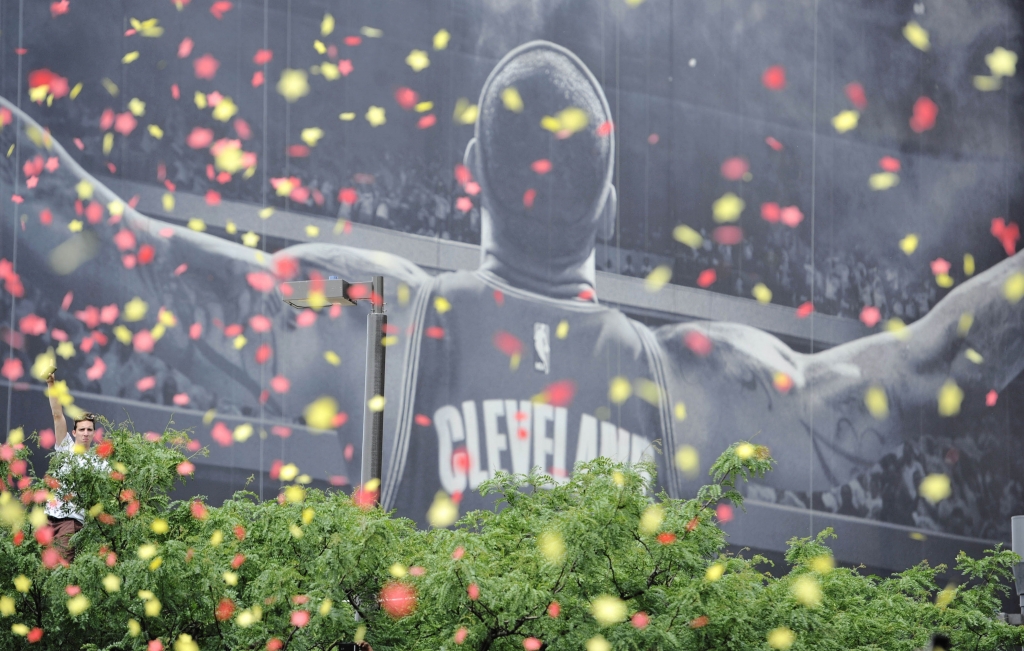 Jun 22 2016 Cleveland OH USA A fan sits atop a tree in front of the Le Bron James mural during the Cleveland Cavaliers NBA championship parade in downtown Cleveland. Mandatory Credit David Richard-USA TODAY Sports ORG XMIT USATSI-271480 ORIG FILE ID