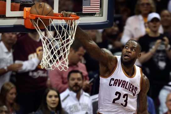 Cleveland Cavaliers forward Le Bron James dunks against the Golden State Warriors during the second half of Game 3 of basketball's NBA Finals in Cleveland Wednesday