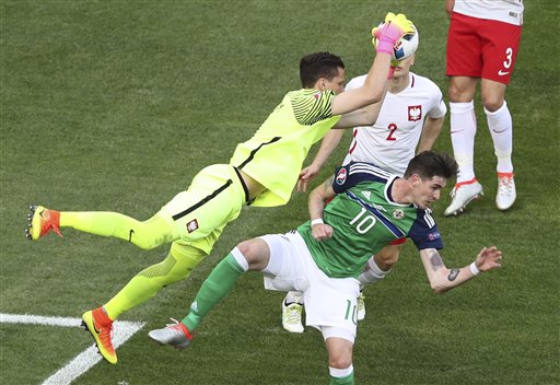 Claude Paris  Associated Press                          Poland goalkeeper Wojciech Szczesny was a brave figure in Poland's goal