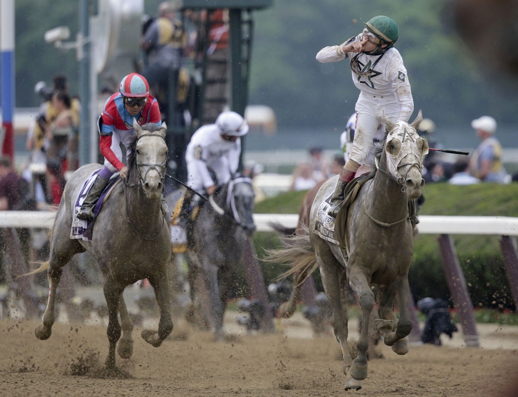 Irad Ortiz Jr. riding Creator celebrates after winning the 148th running of the Belmont Stakes horse race Saturday