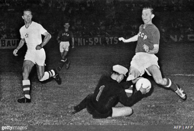 Czech ‘keeper Viliam Schrojf plucks the ball from the feet of a Soviet Union player 1960