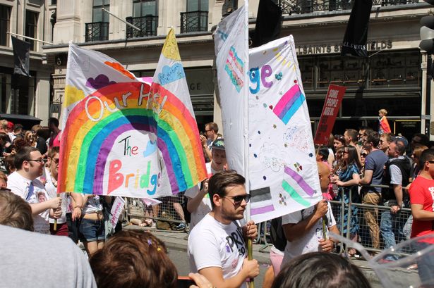 Emily Chudy

Home-made signs are flown marchers sign together and people enjoy the festival spirit at Pride in 2015