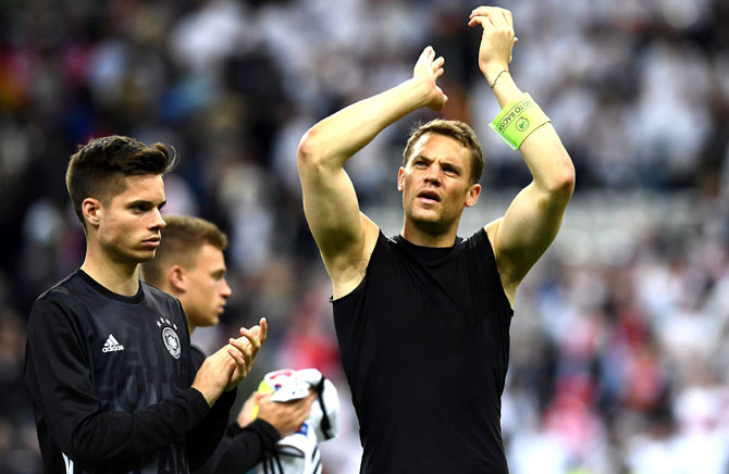 Germany's goalkeeper Manuel Neuer acknowledges the crowd following a 0-0 draw in the Euro 2016 group C football match between Germany and Poland at the Stade de France stadium in Saint Denis near Paris. Pic  AFP