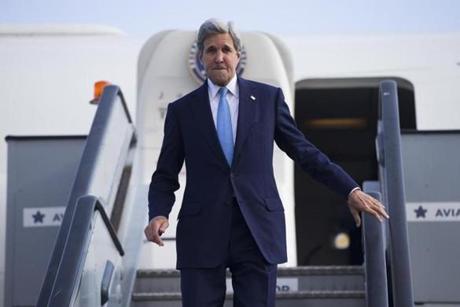 US Secretary of State John Kerry steps off his plane after arriving at Kastrup International Airport Thursday