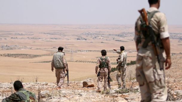 Fighters of the Manbij Military Council take their position in the area of Manbij in Aleppo Governorate Syria