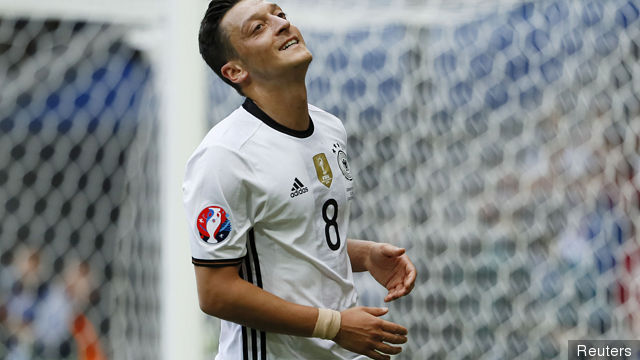 Germany's Mesut Ozil reacts