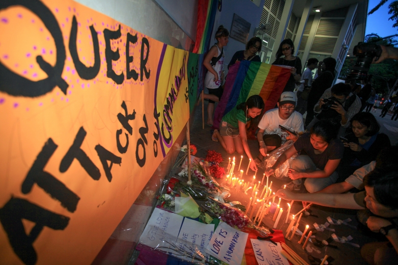 Lesbian gay bisexual transsexual and queer people hold a candle-lit vigil |outside the US Embassy in Bangkok last night in memory of victims of the |massacre in Orlando. US Ambassador Glyn T Davies also joined the event