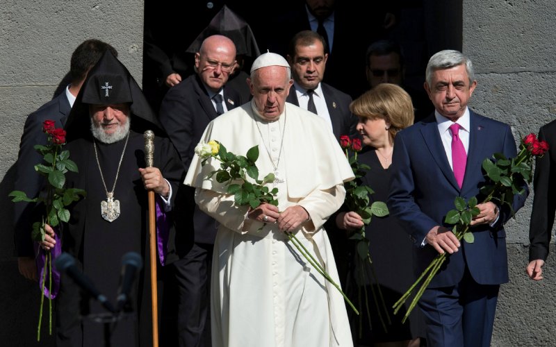 Pope Francis, Catholicos of All Armenians Karekin II and Armenian President Serzh Sarksyan arrive for a ceremony in commemoration of Armenians killed by Ottoman forces during World War One at the Tzitzernakaberd Genocide Memorial in Yerevan Armen