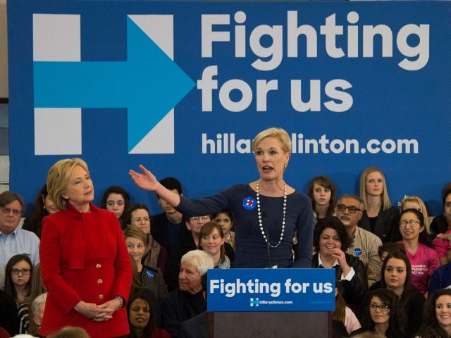 Presidential Candidate Hillary Clinton is introduced by President of the Planned Parenthood Federation of America Cecile Richards at a campaign rally in North Liberty Iowa