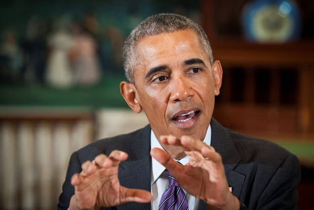 Barack Obama speaks to the media during a lunch with young men from the Washington DC area at the White House