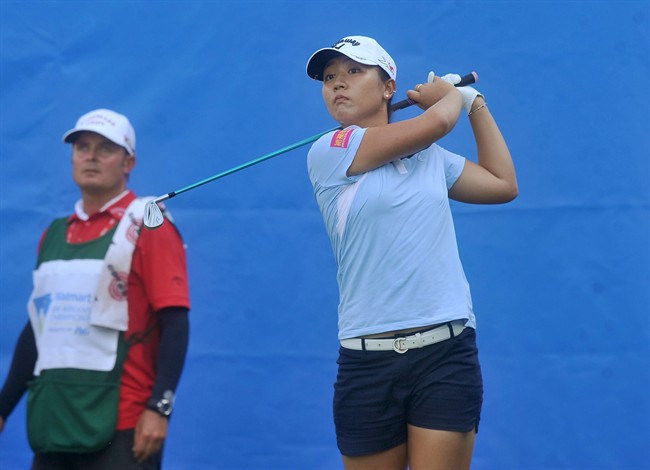 Lydia Ko of New Zealand watches her shot off the 17th hole during the LPGA Wal Mart NW Arkansas Championship golf tournament at Pinnacle Country Club in Rogers Ark. Saturday