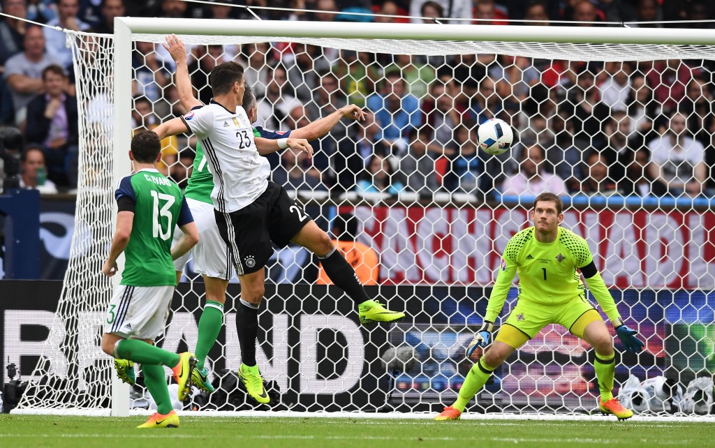 PARIS FRANCE- JUNE 21 Mario Gomez of Germany heads at goal during the UEFA EURO 2016 Group C match between Northern Ireland and Germany at Parc des Princes