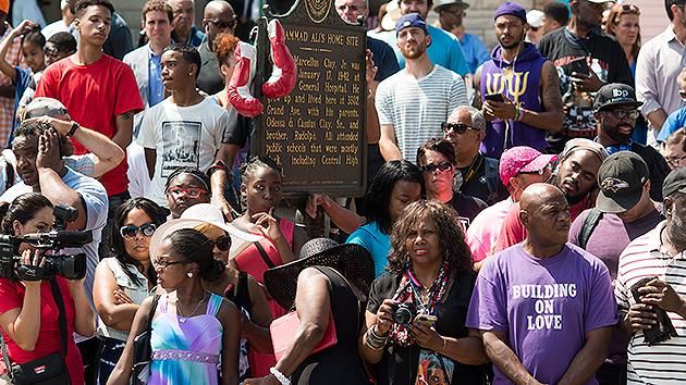 Louisville residents line the street in Ali's hometown. Pic Getty