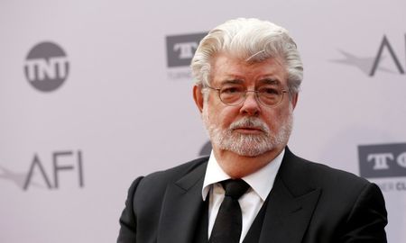 Director Lucas poses at the American Film Institute's 44th Life Achievement Award honoring composer John Williams at Dolby theatre in Hollywood