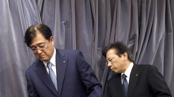 Mitsubishi chairman and CEO Osamu Masuko left and president Tetsuro Aikawa prepare for their press conference in Tokyo