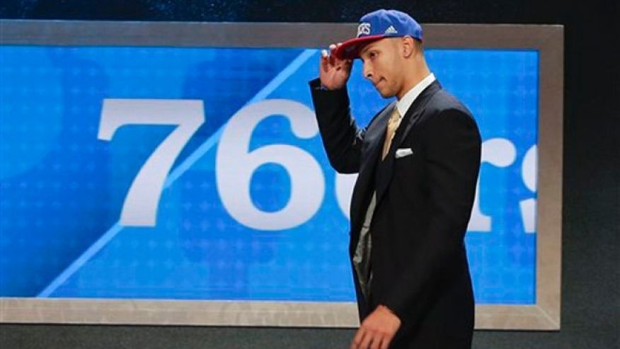 LSU's Ben Simmons walks up on stage after being selected as the top pick by the Philadelphia 76ers during the NBA basketball draft Thursday