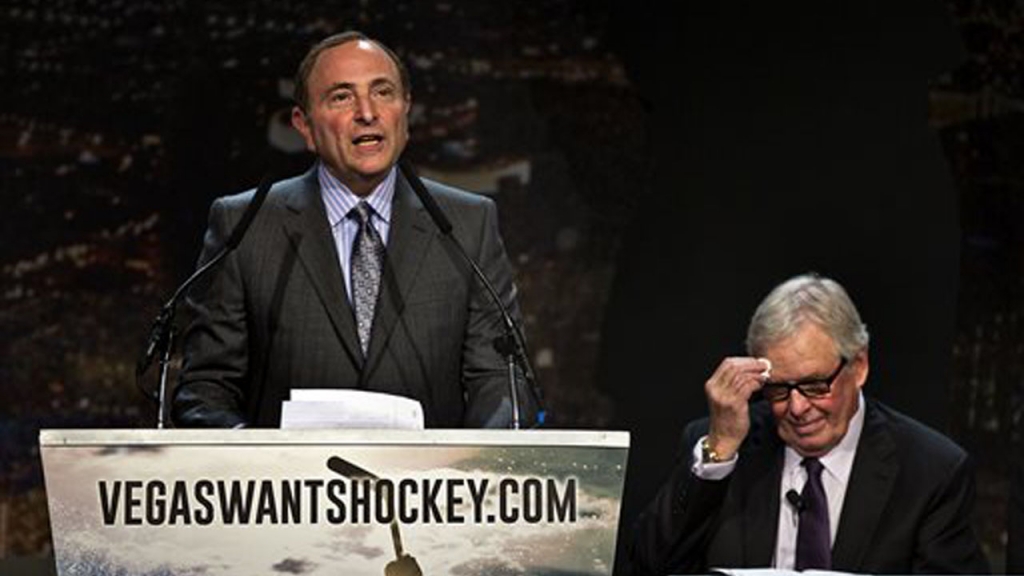 Gary Bettman commissioner of the National Hockey League addresses the crowd as Bill Foley chairman Fidelity National Financial Inc. Black Knight and FIS wipes his forehead during the'Let's Bring Hockey