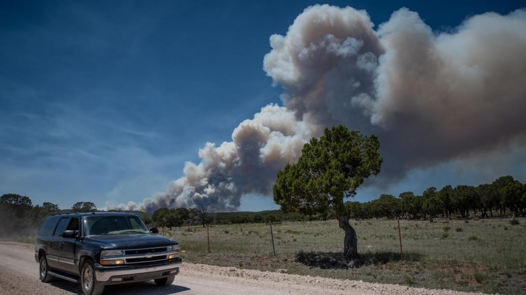 Fire burning near Fourth of July Campground in Manzano Mountains