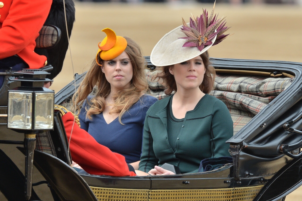 Princess Beatrice and Princess Eugenie arrive in a carriage during the Trooping the Colour ceremony