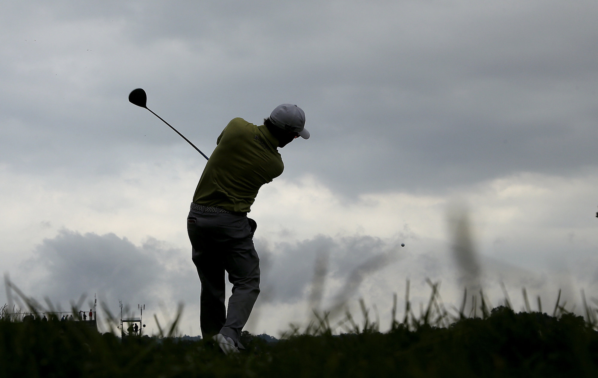 Andrew Landry watches his tee shot on the seventh hole during the first round of the U.S. Open golf championship at Oakmont Country Club on Thursday