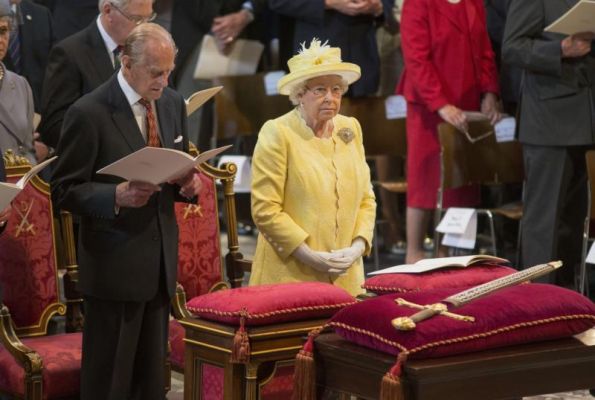 Britain's Queen Elizabeth II and Prince Philip attend