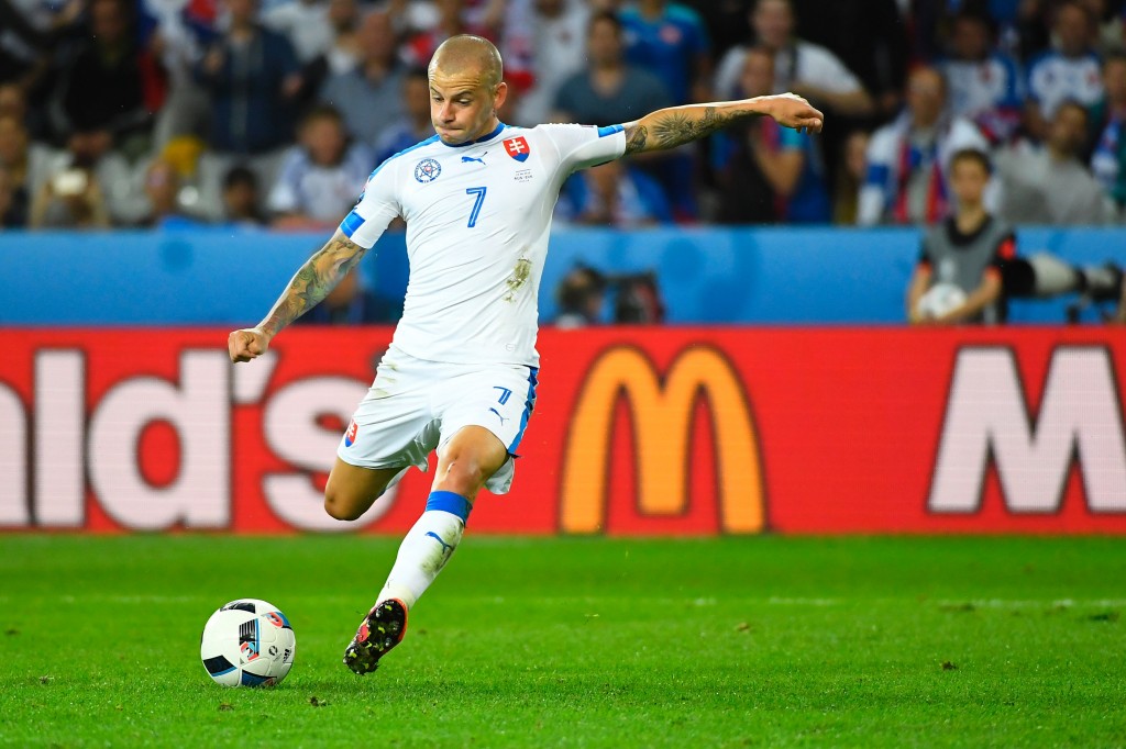 Slovakia's midfielder Vladimir Weiss shoots to score a goal during the Euro 2016 group B football match between Russia and Slovakia at the Pierre Mauroy stadium in Villeneuve-d'Ascq near Lille