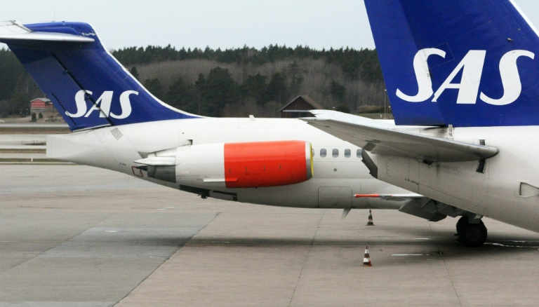 SCANPIX SWEDEN  AFP  File  Johan Nilsson Around 20,000 passengers were stranded after Scandinavian airline SAS cancelled 159 flights due to a Swedish pilots&#039 strike that entered its second day