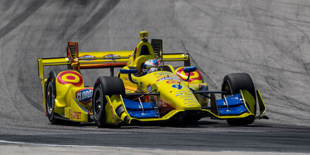 Scott Dixon on the track during practice for the Verizon Indy Car Series KOHLER Grand Prix