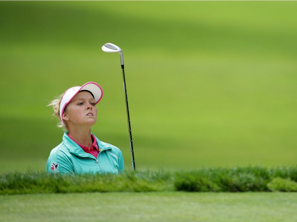 SAMMAMISH WA- JUNE 12 Brooke Henderson of Canada watches her bunker shot on the sixth hole during the final round of the KPMG Women's PGA Championship at Sahalee Country Club