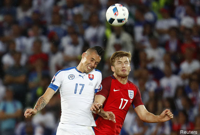 Slovakia's Marek Hamsik in action with England's Eric Dier