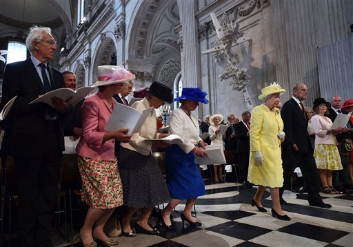 Britain's Queen Elizabeth II and Prince Philip arrive for a National Service of Thanksgiving to mark the 90th birthday of Britain's Queen Elizabeth II at St Paul's Cathedral in London Friday