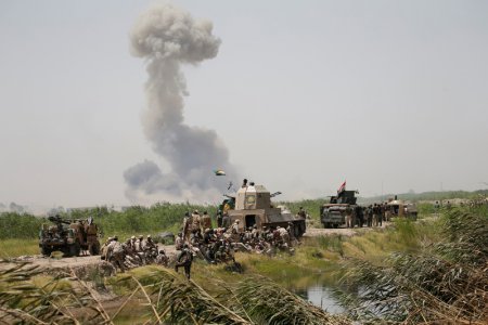 Smoke rises from clashes near Falluja Iraq