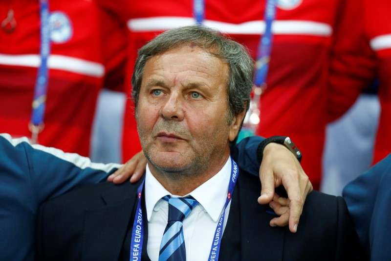 Football Soccer- Slovakia v England- EURO 2016- Group B- Stade Geoffroy-Guichard Saint-Étienne France- 20/6/16 Slovakia head coach Jan Kozak during the national anthem before the game REUTERS  Kai Pfaffenbach Livepic